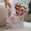 Kit floral com macarrons